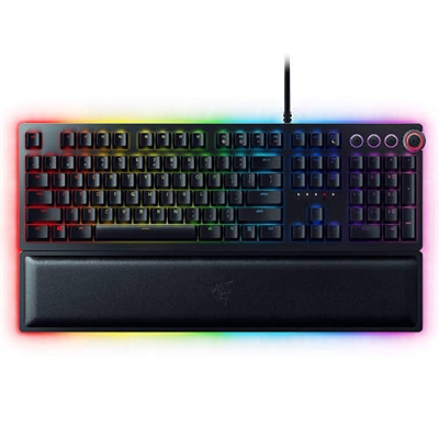 Razer RZ03-03931400-R311 Teclado razer huntsman v2 purple switch espanol rz03-03610700-r311.Con switches ópticos con sonido de click Razer para un accionamiento ultrarrápido con respuesta nítida y táctil: Disfruta de un tecleo rápido y energético con un sonido satisfactorio y una sensación más ligera que los switches mecánicos tradicionales, con una tasa de sondeo de hasta 8000 Hz para una latencia de activación más baja. Teclas de PBT de doble inyección para un acabado robusto y texturizado: Gracias al proceso de moldeado de doble inyección, estas teclas más rígidas y duraderas que las teclas tradicionales no se desgastan ni terminan con un acabado brillante y cuentan con espuma amortiguadora del sonido para un sonido de teclado mejorado:El Razer Huntsman V2 tiene fundas con interior de espuma especial, añadida para una acústica mejorada, que absorbe todos los sonidos metálicos que puedan producirse al pulsar a fondo las teclas.Memoria híbrida local y almacenamiento en la nube para un acceso personalizado a los ajustes estés donde estés: Estate siempre preparado para la partida gracias a la posibilidad de guardar y activar hasta 5 perfiles de memoria integrada, además de la biblioteca de macros y ajustes que puedes crear y aprovechar desde el almacenamiento en la nube. Dial digital multifunción y 4 teclas multimedia para un control más práctico: Configúralas para pausar, reproducir, saltar y retocar todo, desde el brillo hasta el volumen: la comodidad definitiva para que disfrutes del entretenimiento. Reposamuñecas ergonómico para disfrutar de una comodidad duradera mientras juegas: El apoyo robusto se alinea a la perfección al teclado para descargar la presión de las muñecas, de forma que te sientas menos cansado cuando juegas durante mucho tiempo.